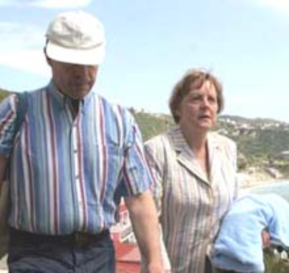 Angela Merkel a fost fotografiată în costum de baie