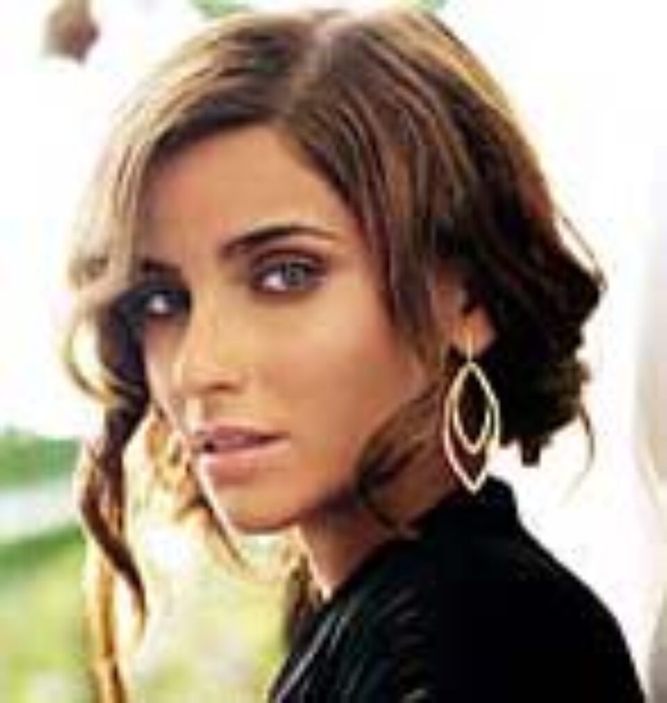 Duetul lui Chris Martin cu Nelly Furtado a fost exclus de pe albumul cântăreței