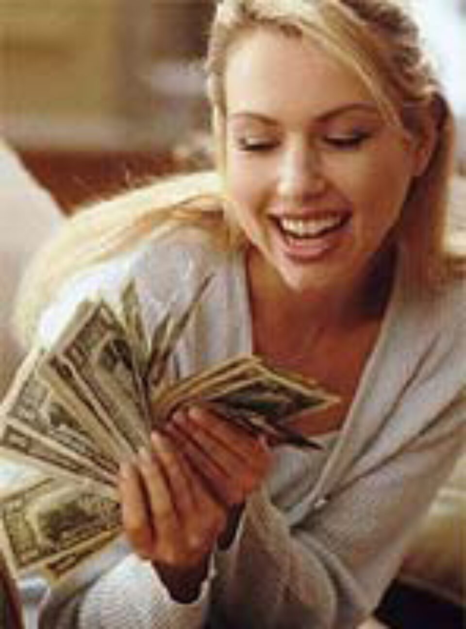 Confirmat științific: banii nu aduc fericirea