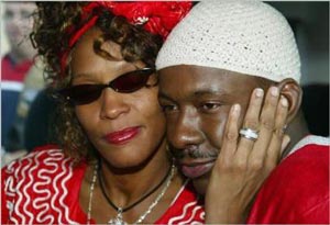 Whitney Houston divorțează de Bobby Brown