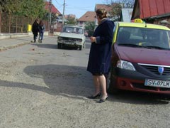 Gropi, praf, gunoaie și chioșcuri de ghetou