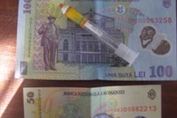 Prins cu șpaga-n buzunarul polițistului