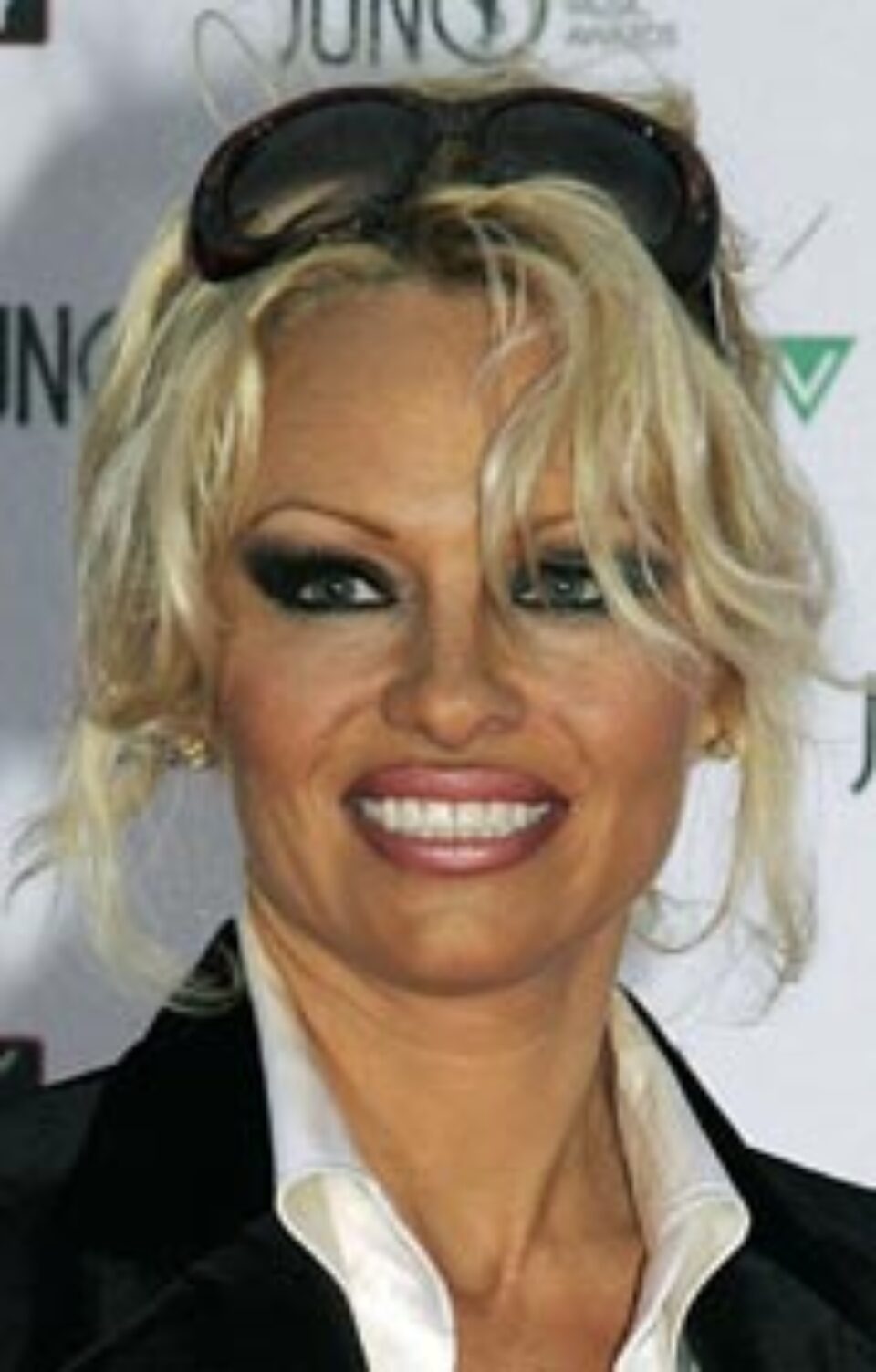 Pamela Anderson vrea un divorț "demn", pentru a-și proteja copiii