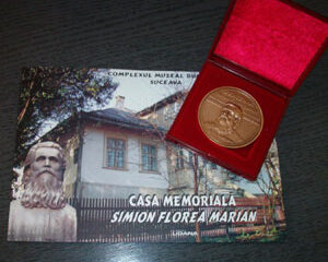 Catalog-album și medalie comemorativă