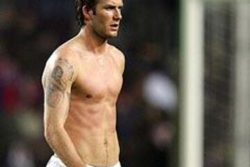Tatuaj cu Sf. Gheorghe pe capul lui Beckham
