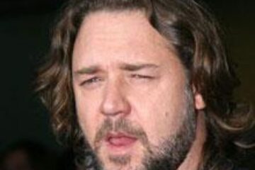 Russell Crowe vrea să fie botezat