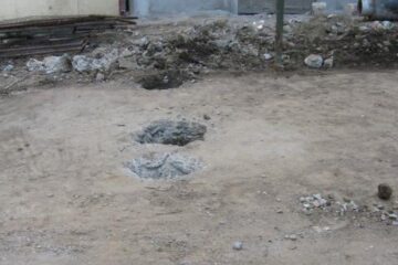 Țarcul de gunoi ai cărui stâlpi de fier au fost smulși