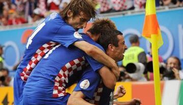 Jucătorii croați se bucură după ce au reușit un meci mare împotriva Germaniei