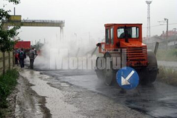 Asfalt turnat pe o ploaie torențială