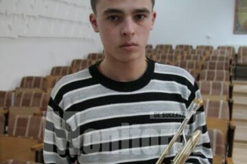 Alin Florin Pavăl are 16 ani și studiază trompeta la Colegiul de Artă