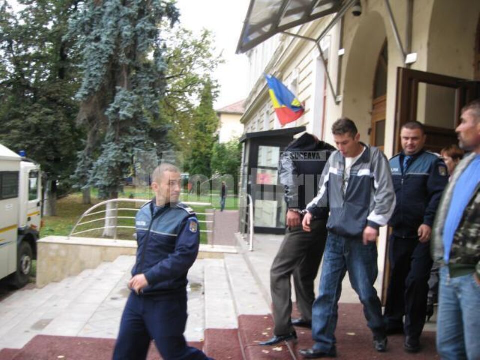 Iulian Șutac (cu fața) și Laurențiu Lungu