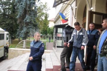 Iulian Șutac (cu fața) și Laurențiu Lungu
