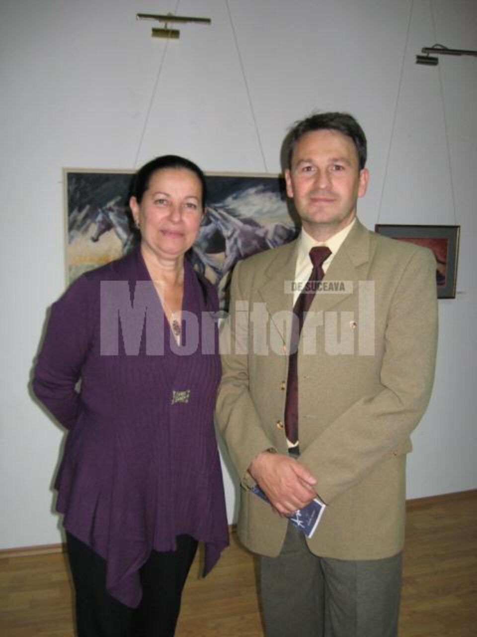 Artiștii expozanți Pusa Pîslaru și Iulian Asimionesei