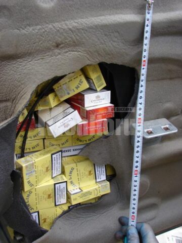 Prins în trafic: Înarmat cu pistol, cu mașina plină cu țigări de contrabandă