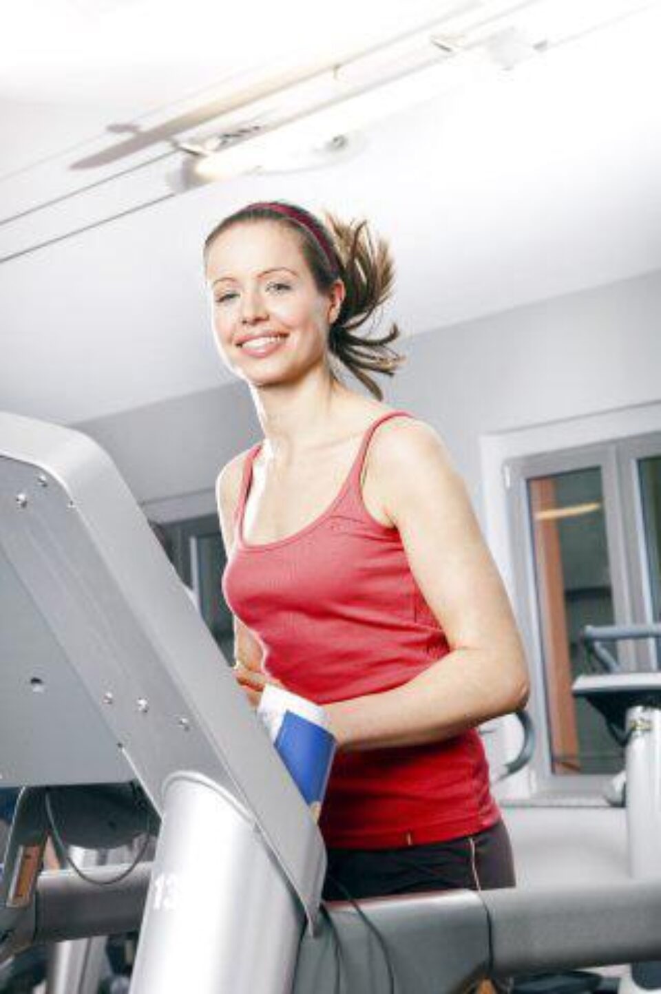 Banda de alergare, potrivită pentru femeile pasionate de sport. Foto: BILDERLOUNGE Banda de alergare, potrivită pentru femeile pasionate de sport. Foto: BILDERLOUNGE