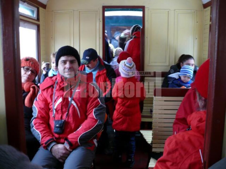Turiști în mocăniță