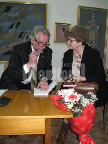 Arcadie Opaiț și Elena Ienache, păstrătoarea documentelior cere au stat la baza editării monografiei comunei Cireș-Opaițeni