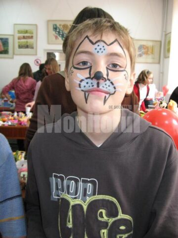 Cu fizionomia schimbată după face painting
