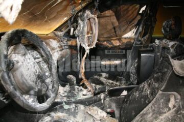 Acțiuni mafiote: Mașina polițistului de frontieră care a refuzat șpaga de la preotul contrabandist a fost incendiată