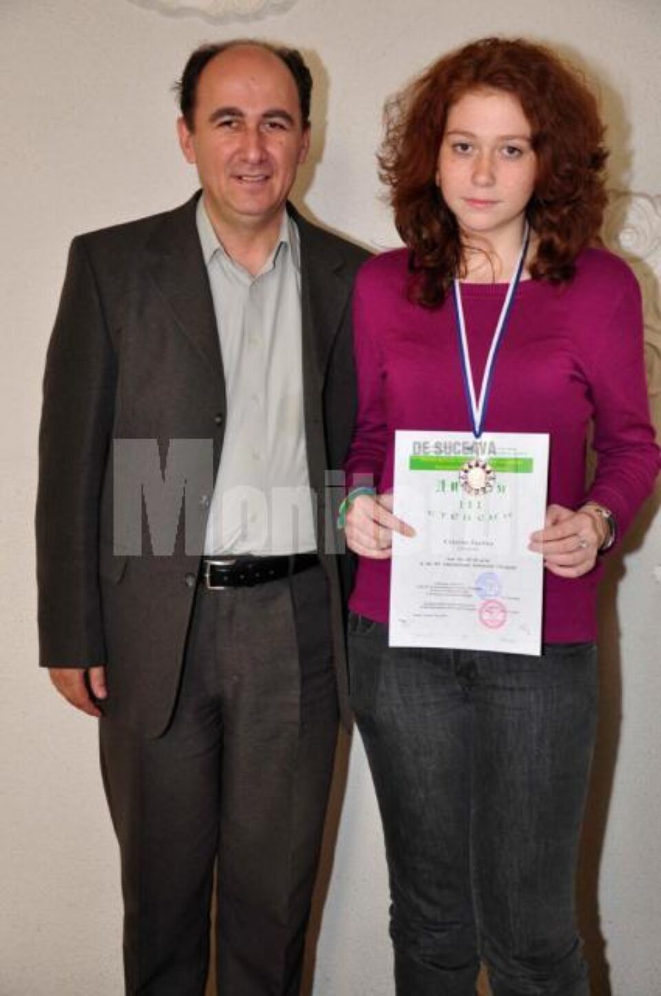 Iustina, împreună cu cel care a pregătit-o, prof. dr. Petru Crăciun