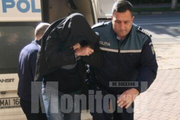 Subinspectorul Florin Muscă în momentul intrării în Palatul de Justiție