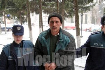 Mirel Fasolă în martie 2010, cu cătușe pe mâini