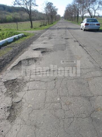 Groapă lângă groapă