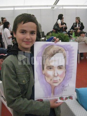 Norocoșii s-au ales cu portrete și caricaturi executate în mod gratuit de invitatul special al evenimentului, Ovidiu Ambrozie Bortă (BOA)