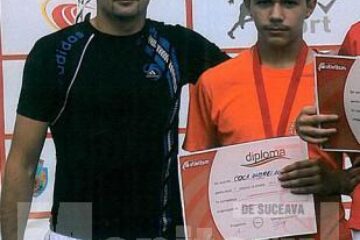 Antrenorul Bogdan Roșcăneanu, alături de vicecampionul Andrei Coca