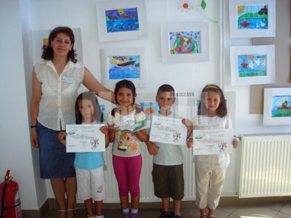 Prof. Lăcrămioara Avădănei și cei patru premianți