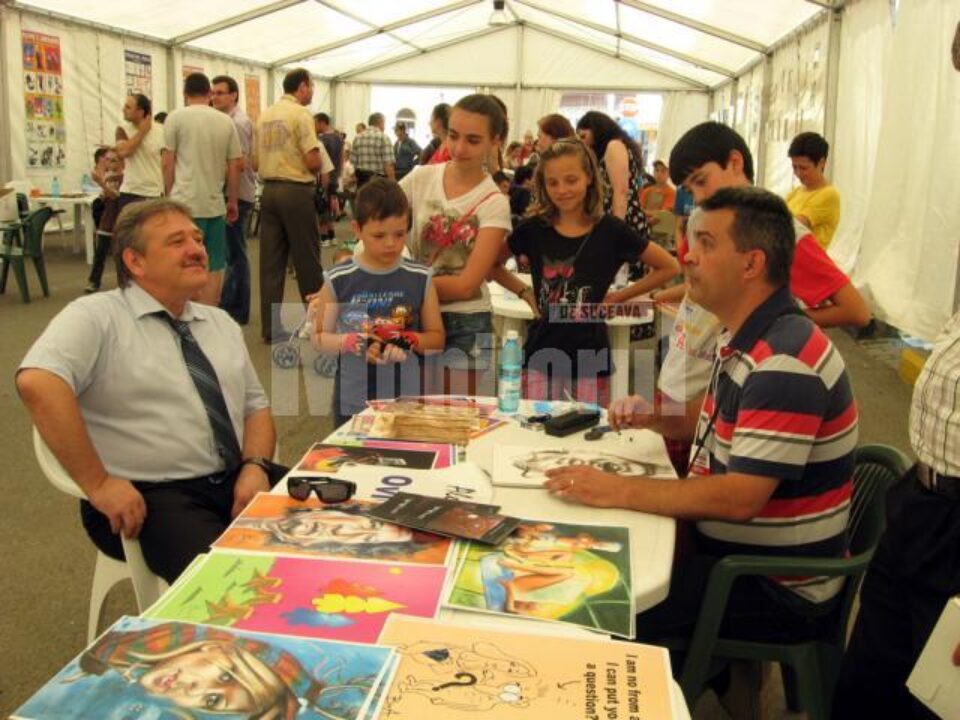 Primarul Marius Ursaciuc și caricaturistul Ovidiu Ambrozie Bortă BOA
