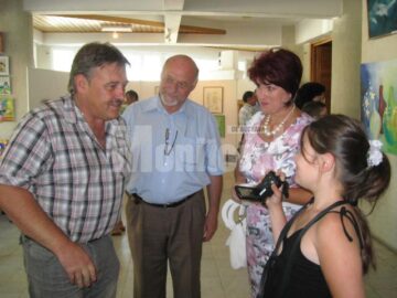 Primarul Marius Ursaciuc în dialog cu Briana Ohmt, cel mai tânăr participant al taberei de pictură