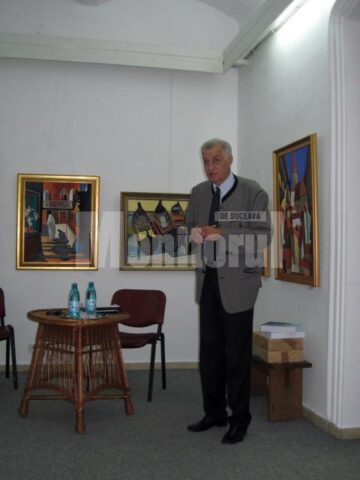 Radu George Serafim susținându-și prelegerea