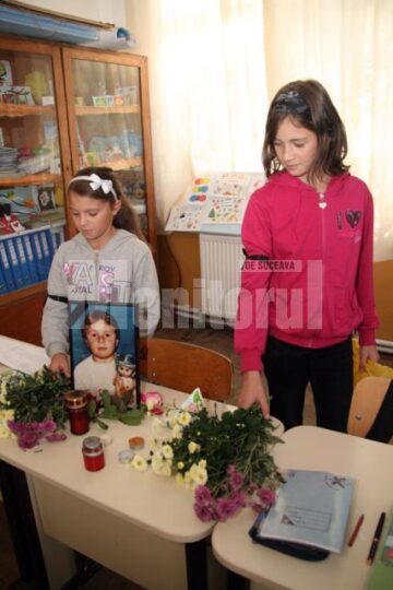Flori, lumânări, regrete