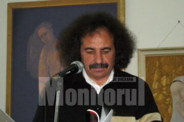 Vasile Tudor citind din poemele sale