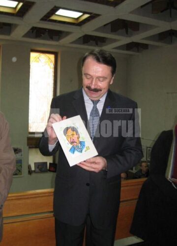 Vicepreședintele CJ Suceava, Vasile Ilie, cu portretul realizat de COV