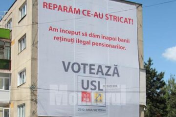 Fațada blocului a fost acoperită aproape în totalitate cu un banner electoral imens