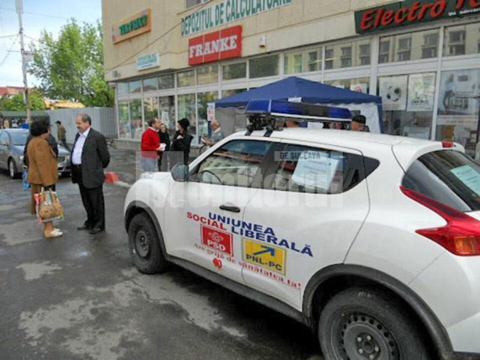 Mașini cu girofar și sigla USL, în campanie electorală prin județ