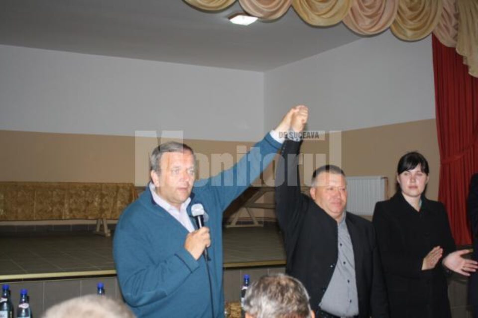 Gheorghe Flutur și primarul comunei Baia, Mihail Cârlan