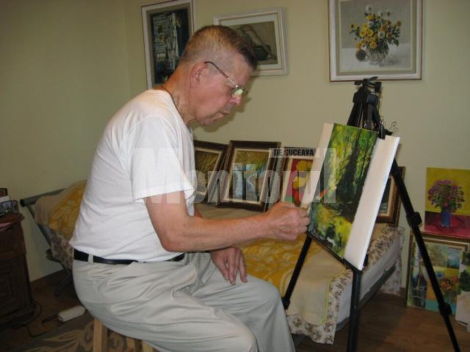 Ștefan Danilevici pictează ascultând discret muzică instrumentală
