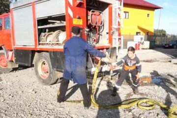 Preotul Gabriel Florea și fiul său în vârstă de 12 ani