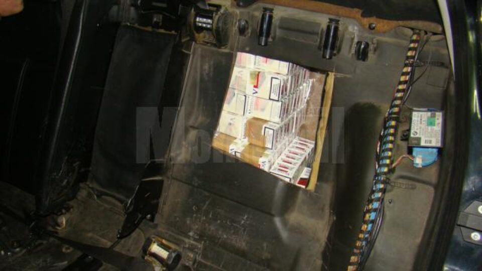 Locaș special amenajat în spatele spătarului banchetei autoturismului BMW