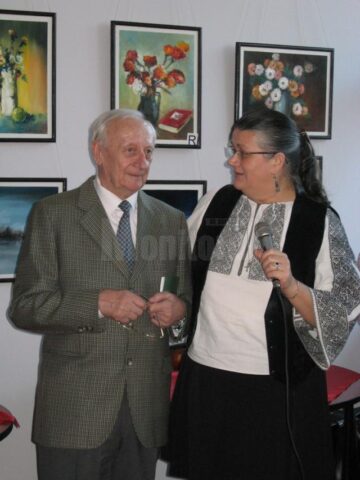 Vernisajul unei expoziții de pictură realizată de artistul plastic Radu Bercea