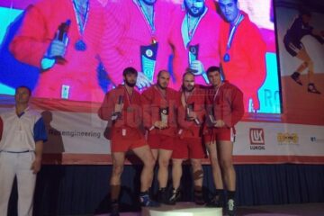 Gheorghe Ignat (al doilea din dreapta), pe podiumul Europenelor, alături de greii care au luptat la +100 de kilograme