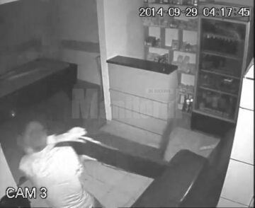 Imagine surprinsă de camere cu unul dintre autorii distrugerilor