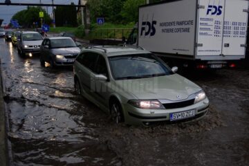 Drum inundat la Șcheia