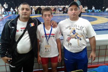 Valentin Dumitru Boicu, încadrat de antrenorii Florin și Costel Rusu