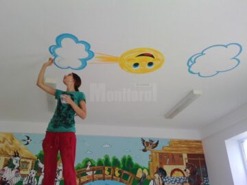 Universul poveștilor prinde viață pe pereți sub pensulele mânuite de două sucevence talentate