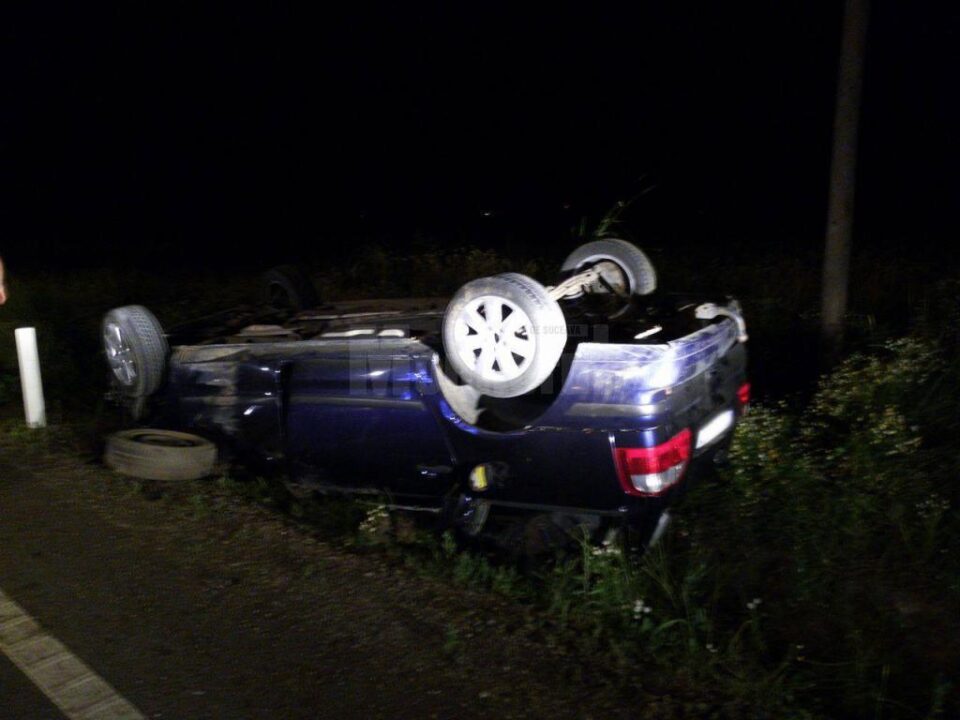 Mașina răsturnată