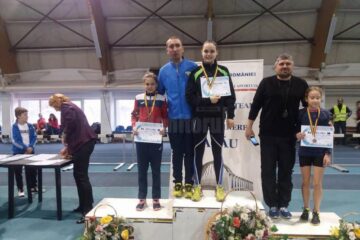 Antrenorul Cristian Prâsneac, alături de eleva sa medaliată cu aur, Claudia Ionela Costiuc